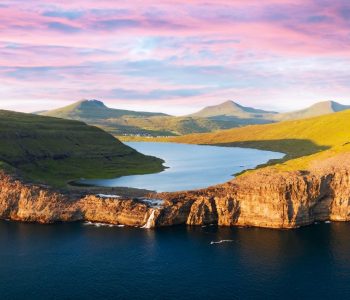 Sorvagsvatn lake on cliffs of Vagar island in sunset, Faroe Islands